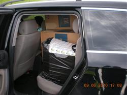 cigarety na zadních sedadlech